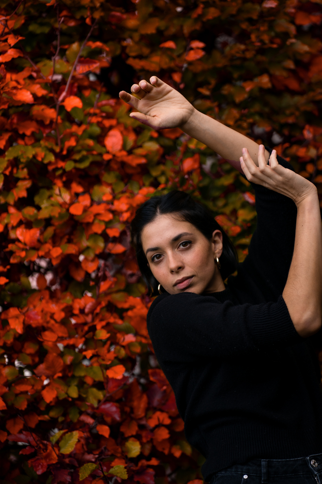 portrait of a model in autumn leaves