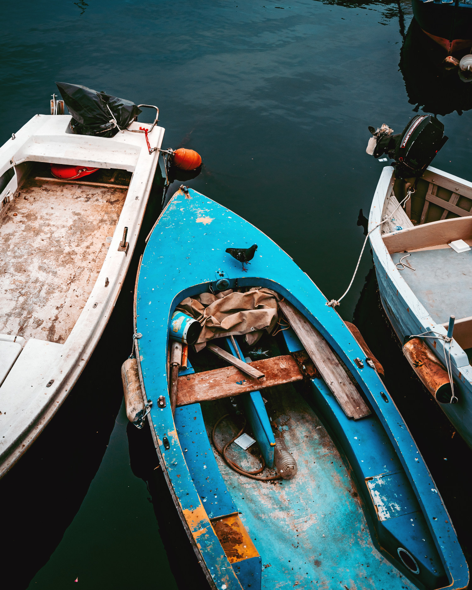 Street photograph of boats on a dock in Bari